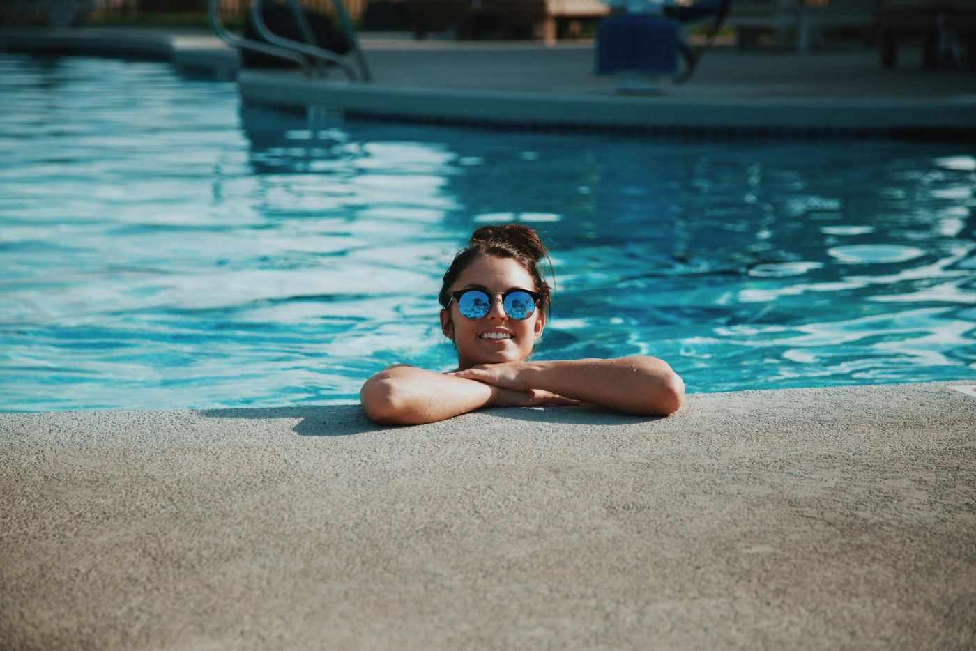 Homeowner enjoying a clean, well-maintained pool